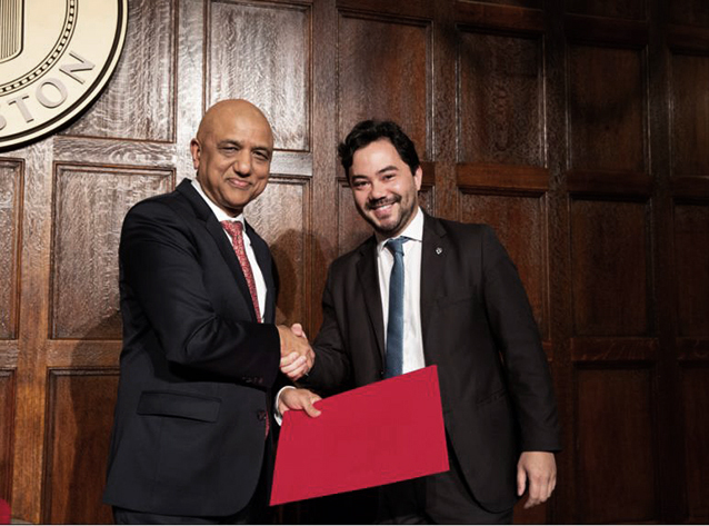NOJA Power Brazil CEO and MD Bruno Kimura receiving his certification (right)